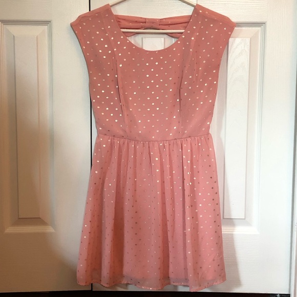 pink dress with gold polka dots